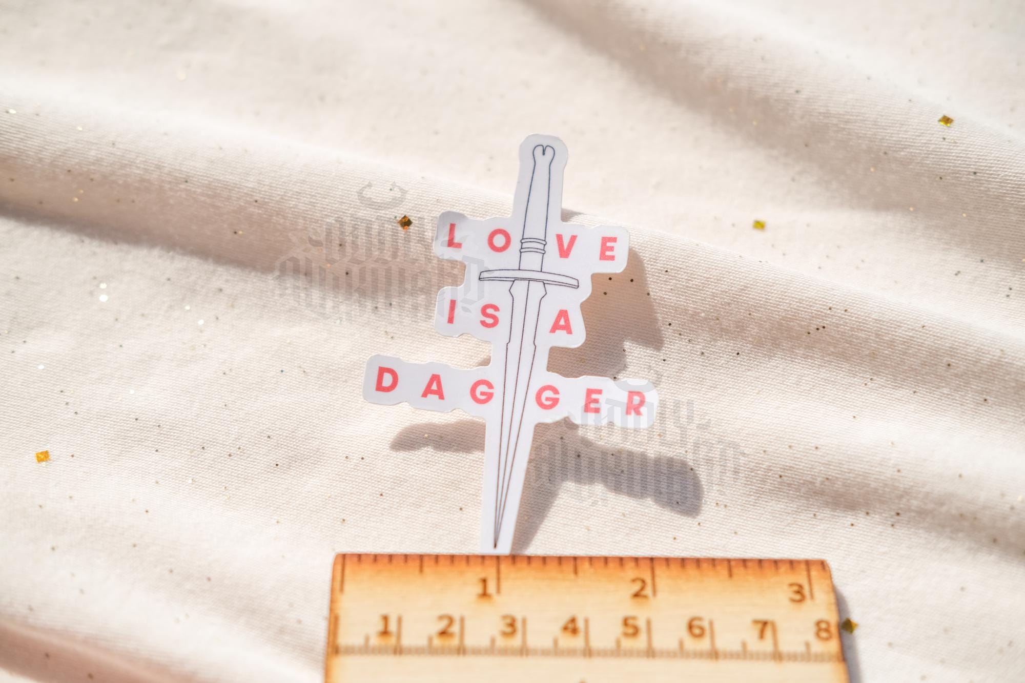 Love is a Dagger Sticker