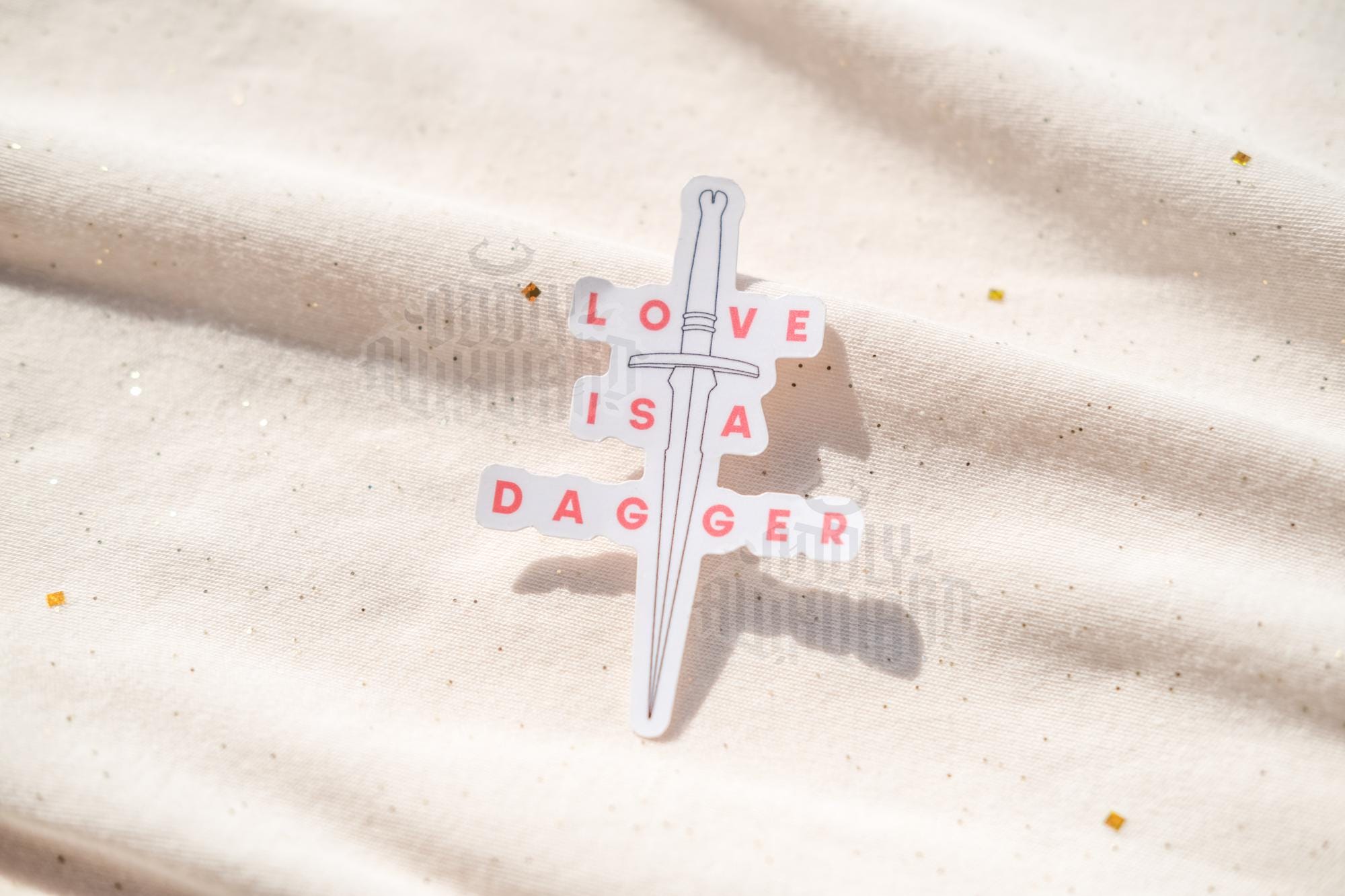 Love is a Dagger Sticker